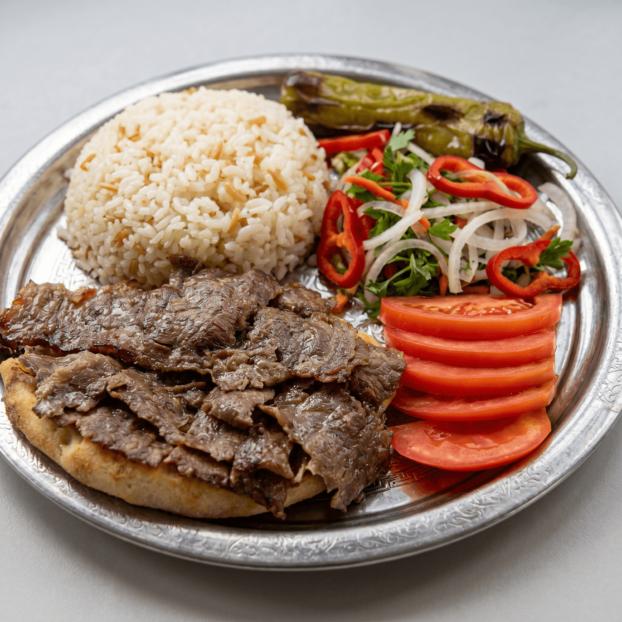 Pilav Üstü Döner (Tam) (100 Gr)